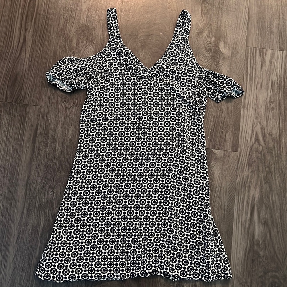 Navy and white patterned dress.